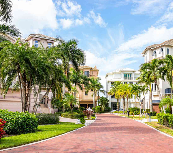 Street view image of a residential community in Bonita Springs, Florida